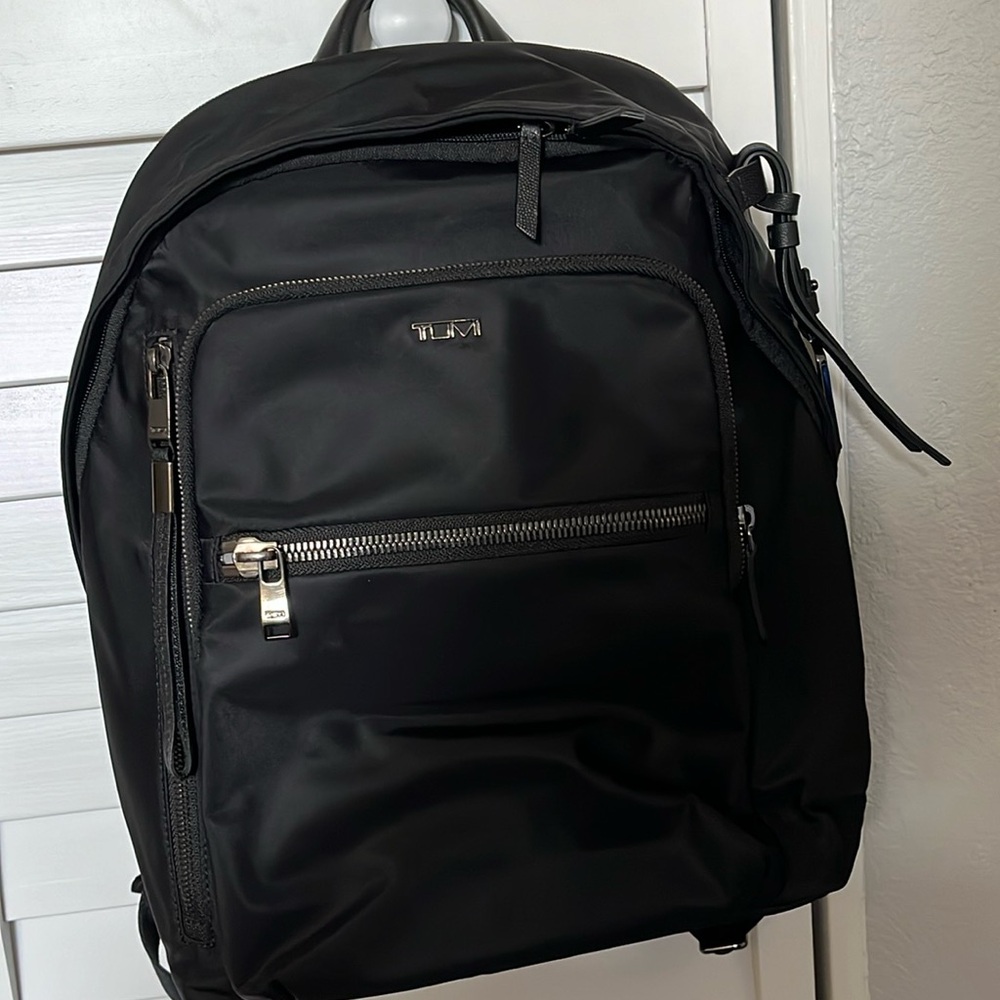 Tumi backpack used, but looks brand new